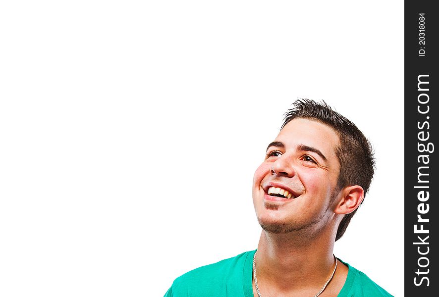 Young man with green t-shirt smiling. Very candid picture. Young man with green t-shirt smiling. Very candid picture.