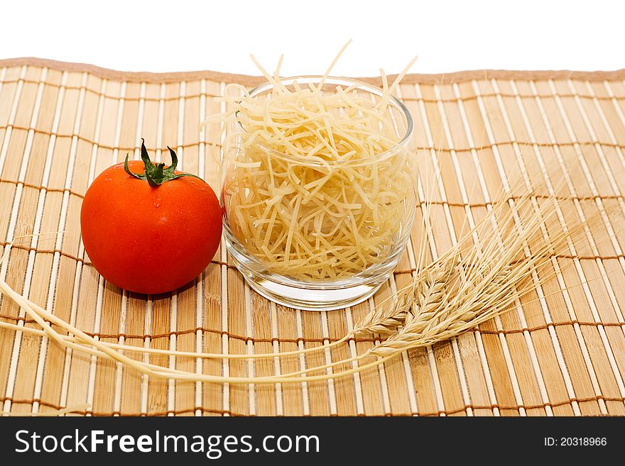 Spaghetti with tomatoes on white background. Spaghetti with tomatoes on white background.