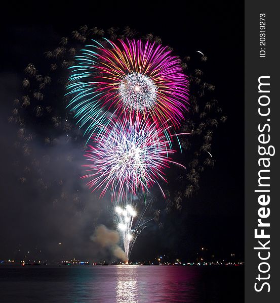 Colorful fireworks over the lake