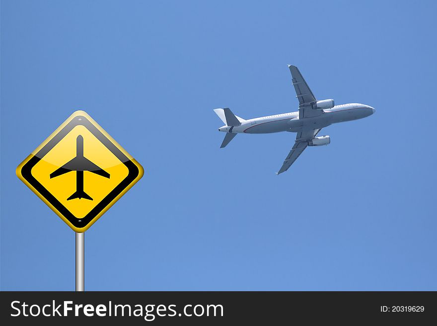 Airplane warning sign on blue sky background