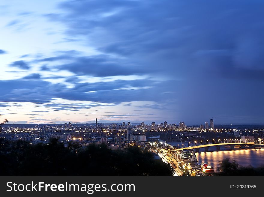 Night cityscape with havansky bridge in Kyiv