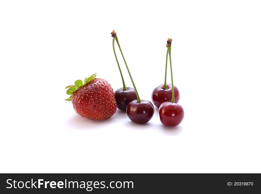 Red summer berries isolated on white