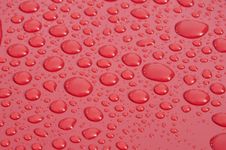 Water Droplet On Red Surface Stock Images Water Droplet On Red Surface Stock Images