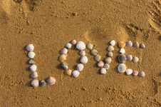 Love Symbol Written On Sand With Shells Royalty Free Stock Photos Love Symbol Written On Sand With Shells Royalty Free Stock Photos