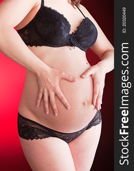 Woman at a late stage of pregnancy. Woman at a late stage of pregnancy