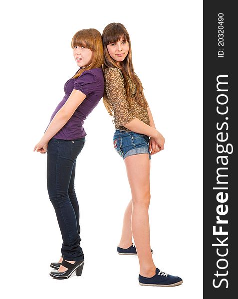 Full-length portrait of two girls, isolated on a white background