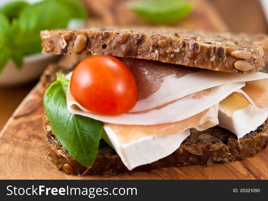 Wholemeal Sandwich With Prosciutto And Camembert