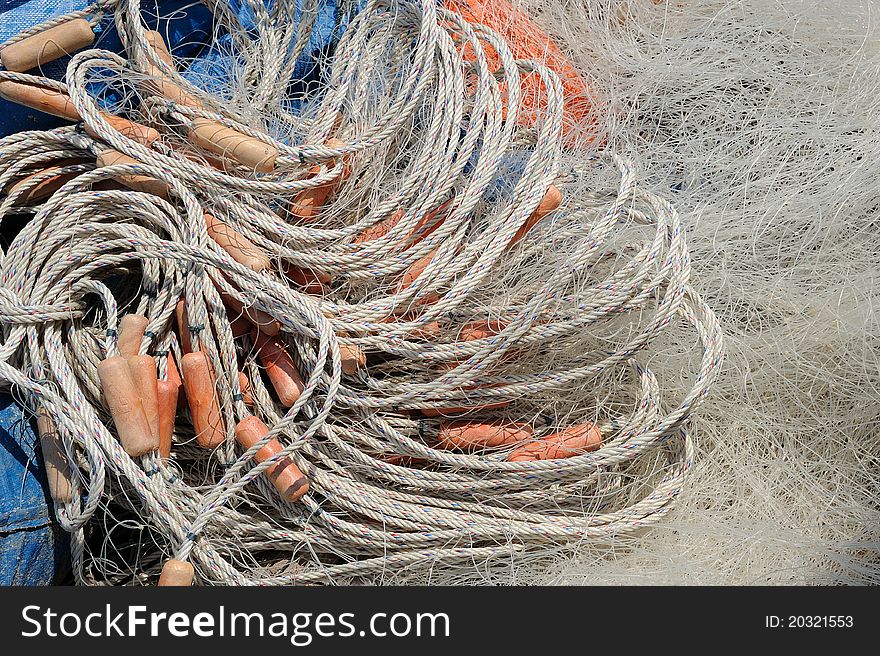 Close-up of fishing net and floats background