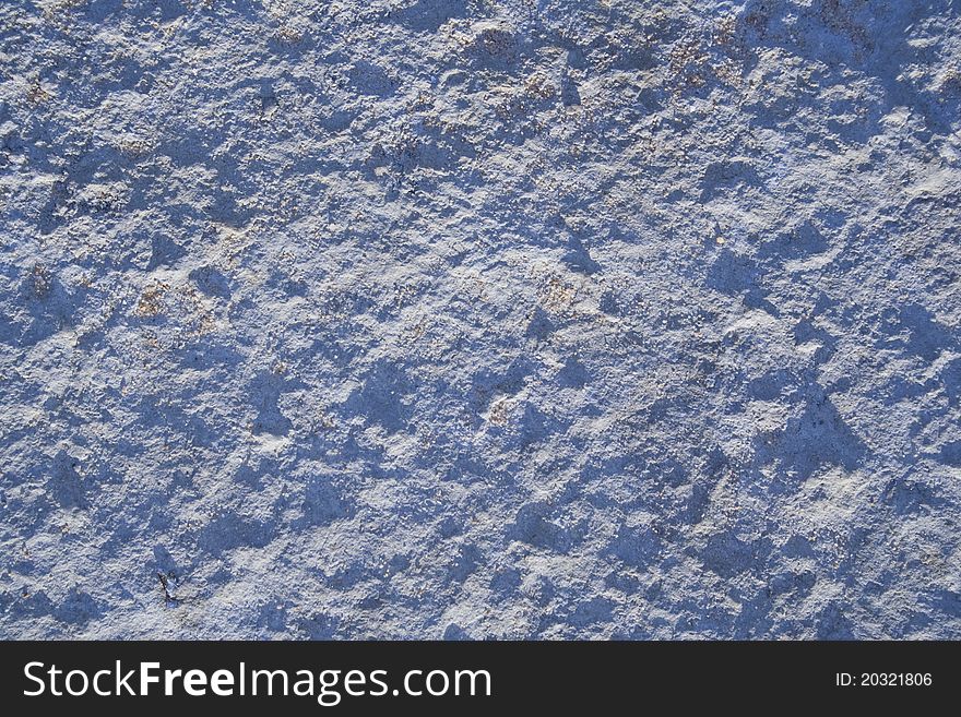 Blue stone texture of a beach pier. Blue stone texture of a beach pier