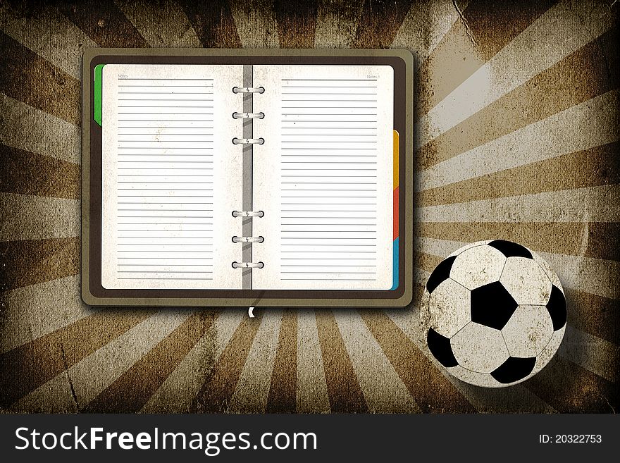 Football and blank notebook on grunge vintage background