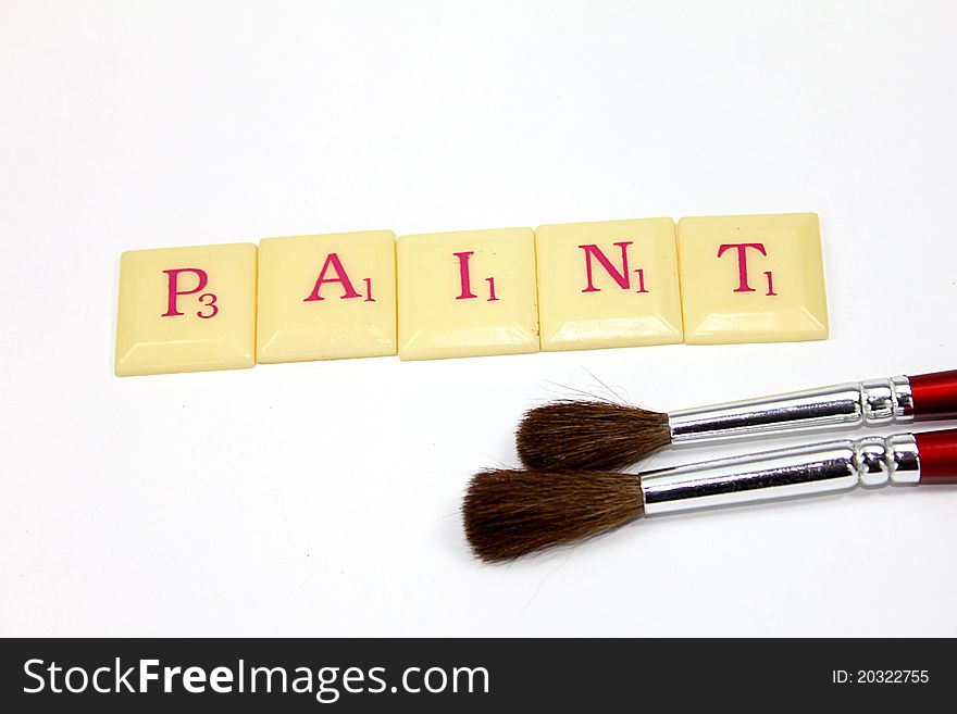 Paint word with brushes isolated white background