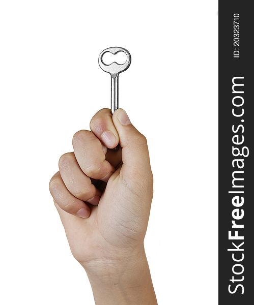 Hand holding key. isolated on white background