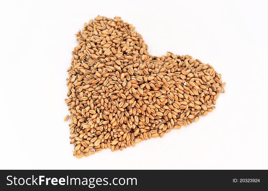 A wheat berry heart shape isolated on white - valentines day
