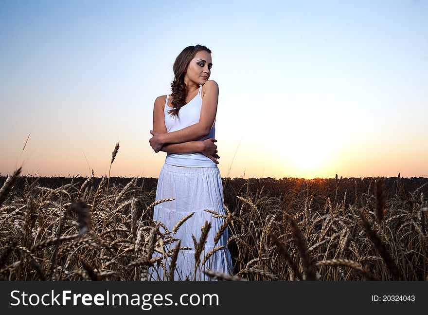 Woman in wheat field