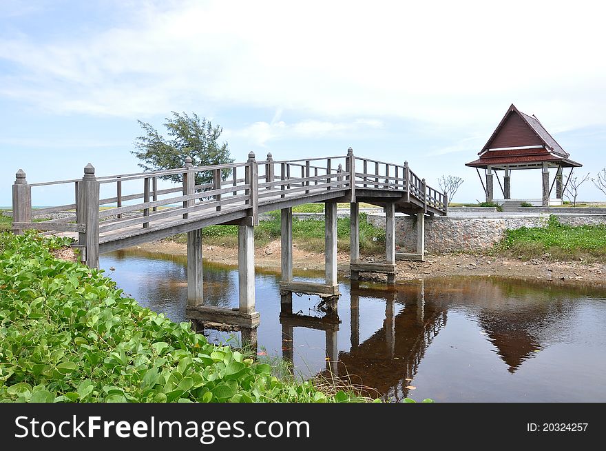 Wooden bridge at garden with blue sky