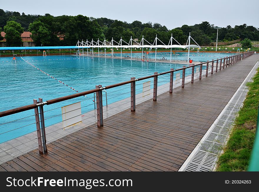 Swimming pool in summer day