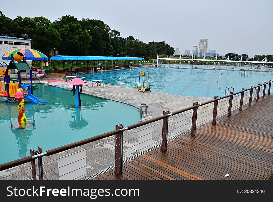 Swimming pool in summer day