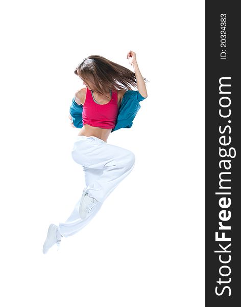 New pretty modern slim hip-hop style woman dancer jumping and dancing isolated on a white studio background. New pretty modern slim hip-hop style woman dancer jumping and dancing isolated on a white studio background