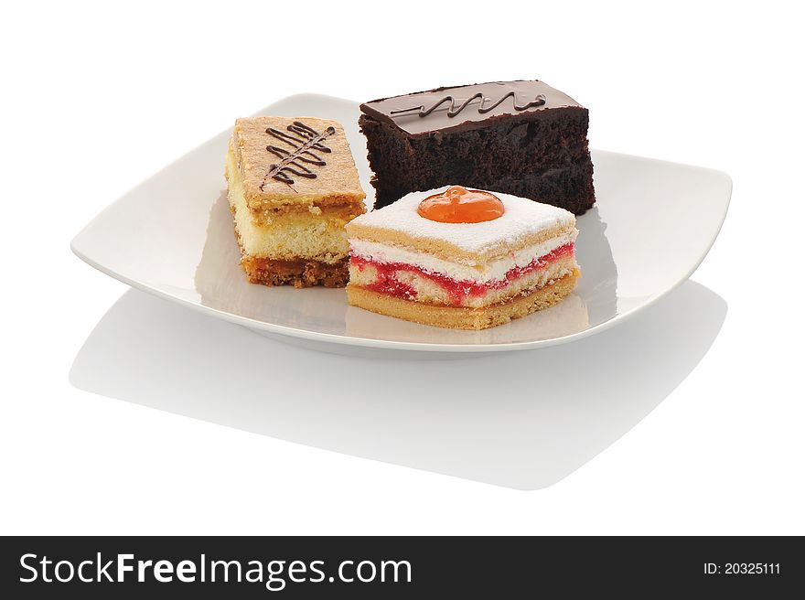 Pieces of cake on white isolated background