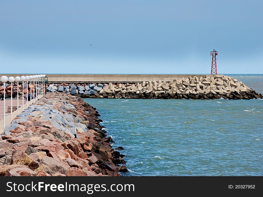 Wave breaker at the canal entrance of Piriapolis marina, Uruguay