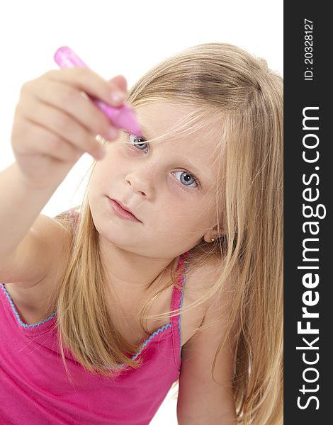 Little blonde girl holding a pink crayon out to camera on white background. Little blonde girl holding a pink crayon out to camera on white background.