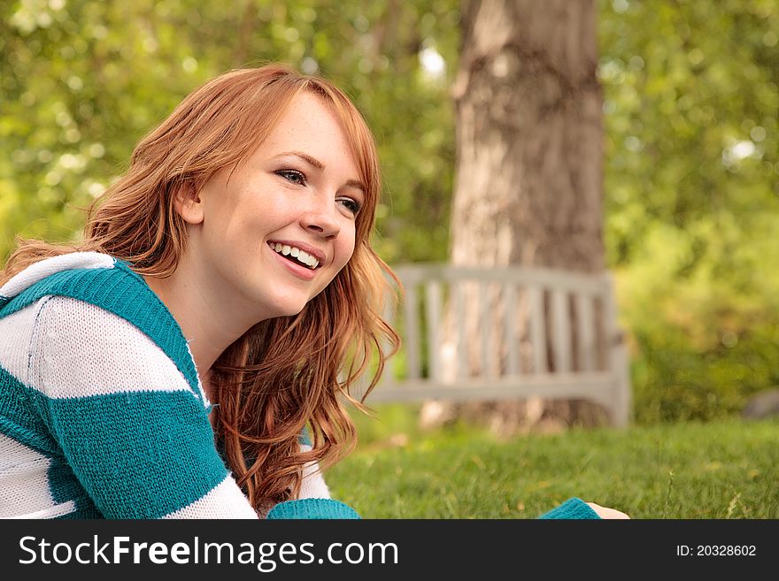 Girl Smiling In The Park