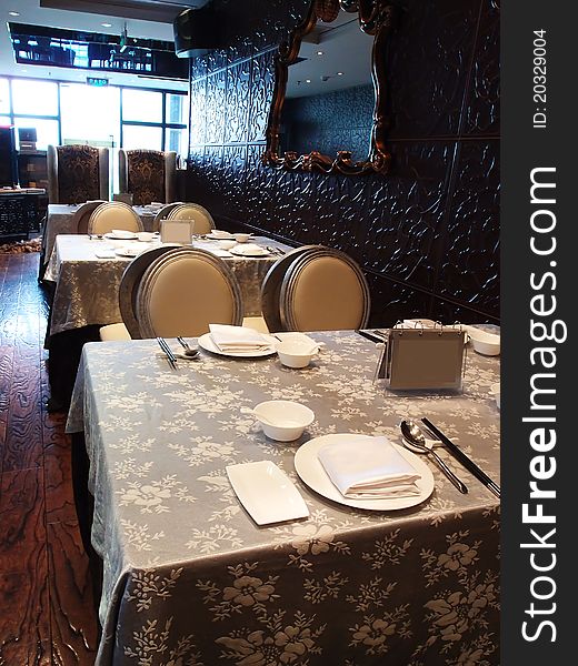 Table and chairs of luxury chinese restaurant. Table and chairs of luxury chinese restaurant.