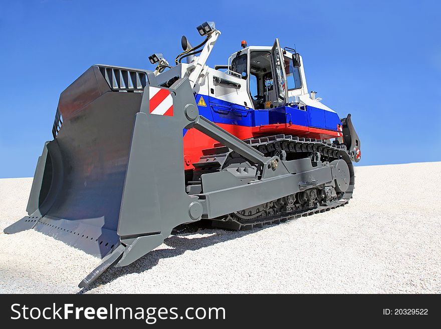 A large  bulldozer at a construction site