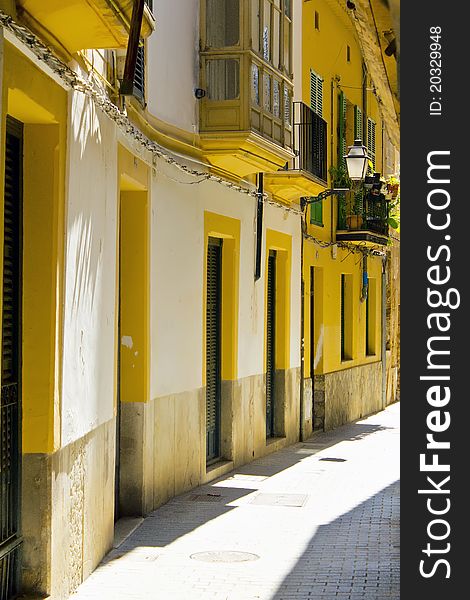 Alleyway in a back street of Palma city. Alleyway in a back street of Palma city