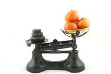 Weighing Tomatoes. Stock Photos