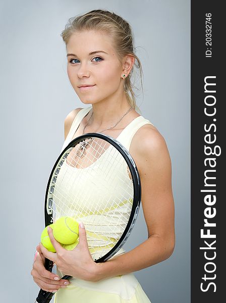 Girl with a tennis racket