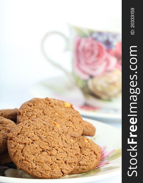 Cookies and coffee morning refreshments on white background