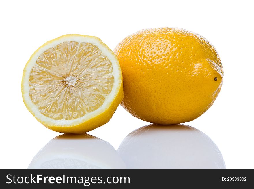 Two lemons isolated on white background