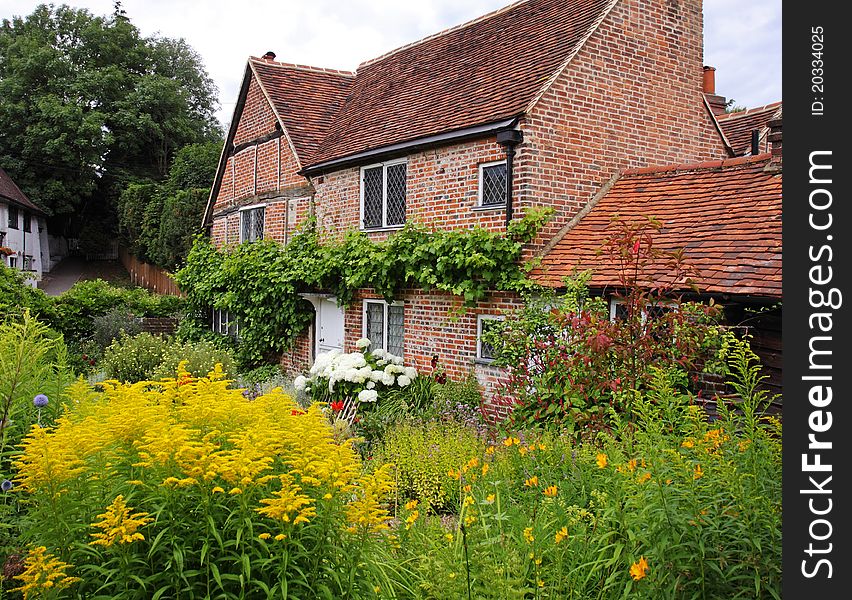 Traditional English Village Cottage And Garden