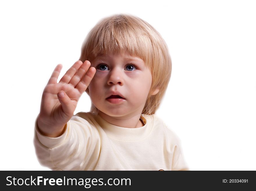 The little girl in a dress with arm outstretched on a white background