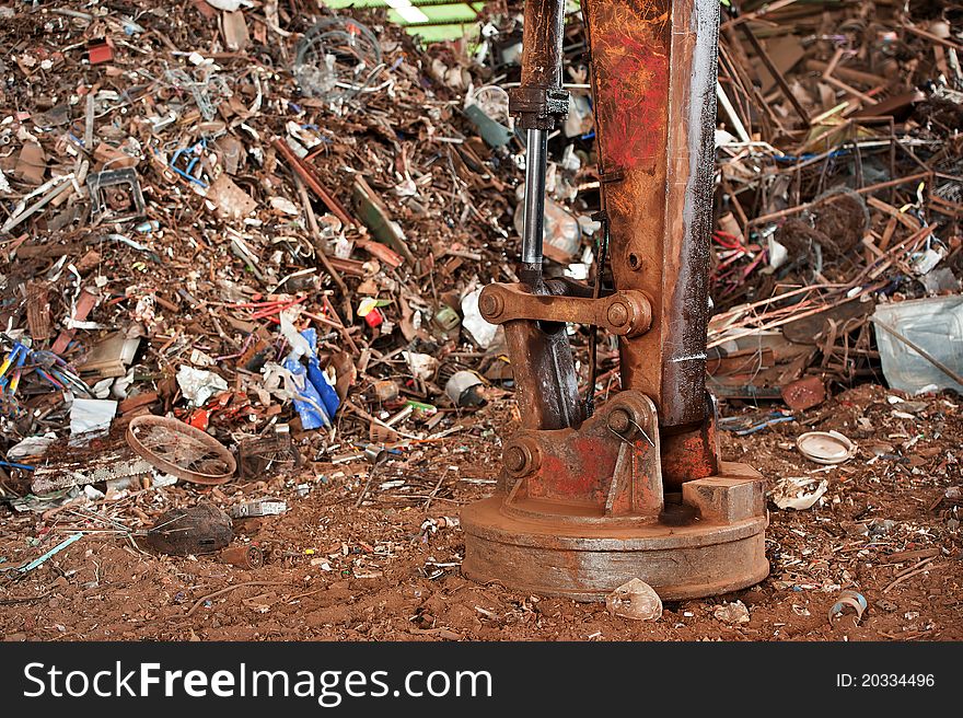 Big magnet in junk yard. Big magnet in junk yard