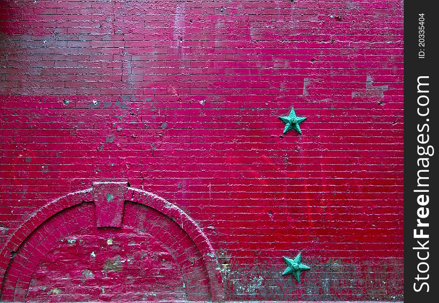 Very old and worn red brick wall in New York City