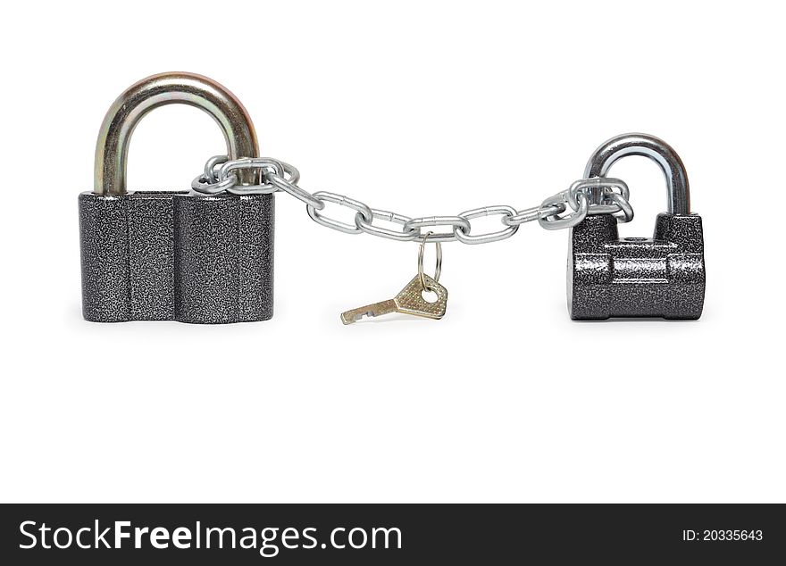 Two padlocks constrained with chain and key. Isolated on white with clipping path. Two padlocks constrained with chain and key. Isolated on white with clipping path