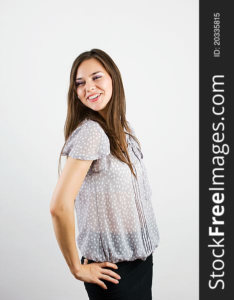 Isolated portrait shot of a beautiful caucasian woman. Happy and smiling. Isolated portrait shot of a beautiful caucasian woman. Happy and smiling