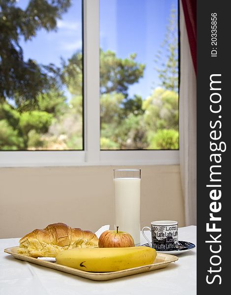 Healthy breakfast with milk, coffee, fruit and croissant. Healthy breakfast with milk, coffee, fruit and croissant