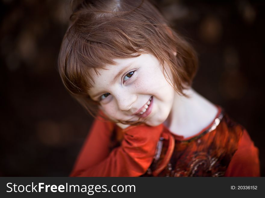 Portrait of red hair smilling girl