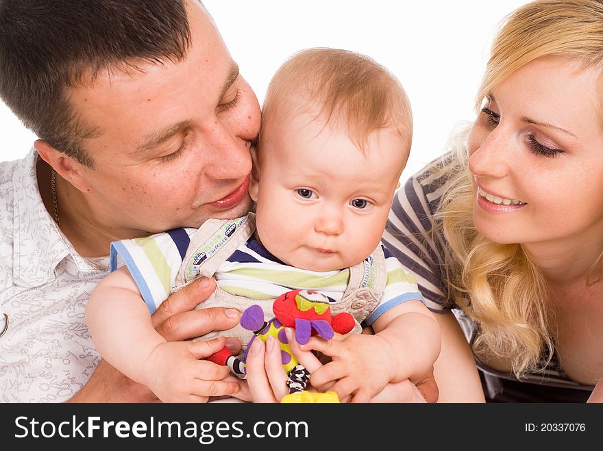 Portrait of a beautiful family on a white. Portrait of a beautiful family on a white