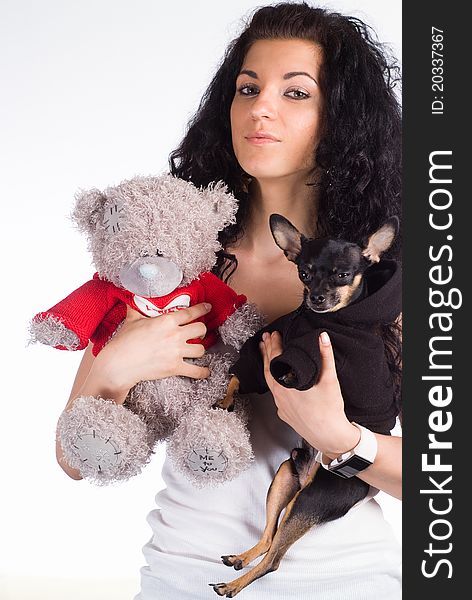 Cute girl with toy and dog on white. Cute girl with toy and dog on white