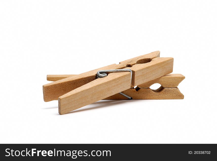 A paiar of vintage wooden clothespins