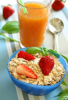 Oats And Strawberry In Bowl And Glass Of Juice Royalty Free Stock Image Oats And Strawberry In Bowl And Glass Of Juice Royalty Free Stock Image