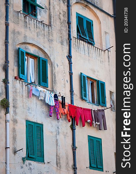 Clothes hanging above an Italian palace