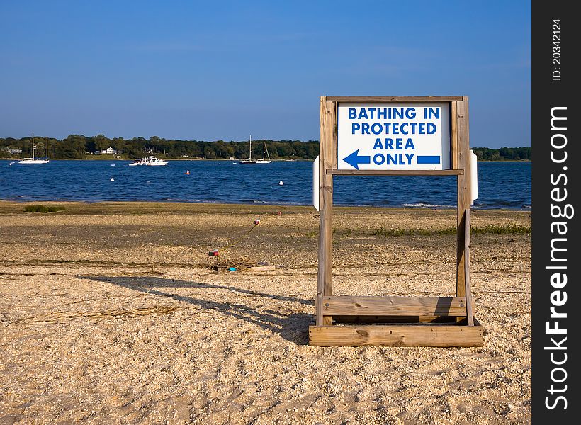 Sign instructing bathers at the beach where to swim. Sign instructing bathers at the beach where to swim