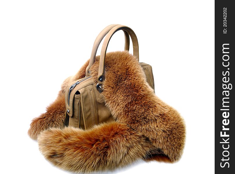 Brown womens bag with fur on white