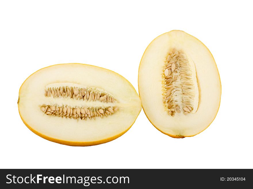 Cut melon half isolated on a white background. Cut melon half isolated on a white background