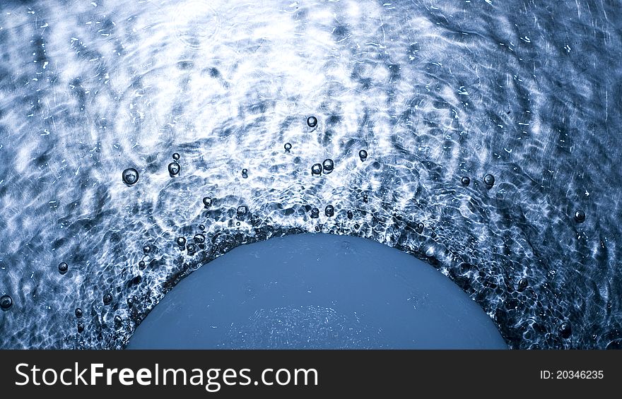 Bubbles in blue water with circle. Bubbles in blue water with circle